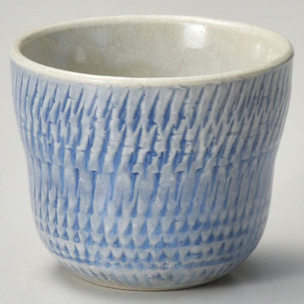 Japanese cup with blue glaze and line details