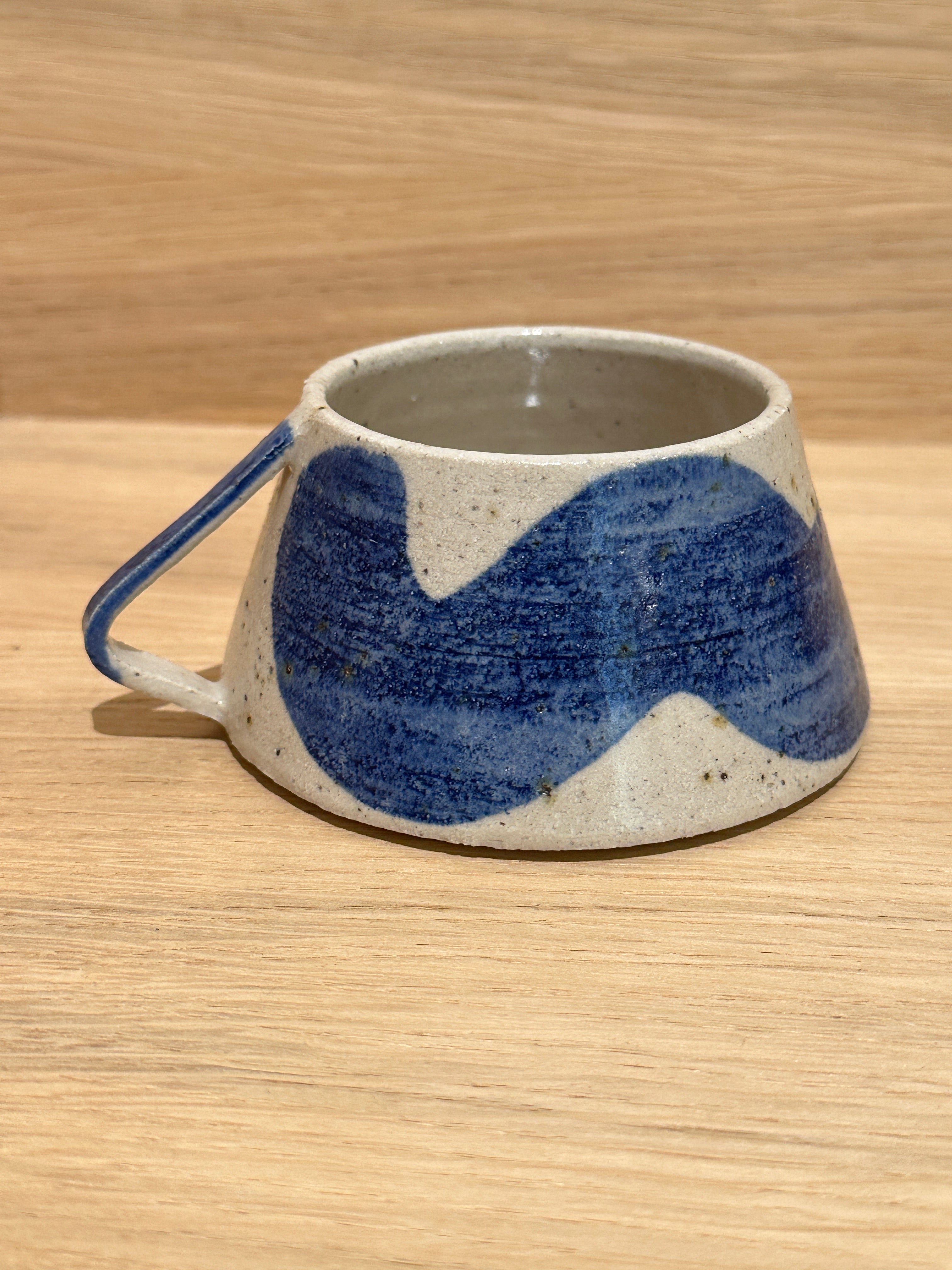 Wavy cup with blue wave