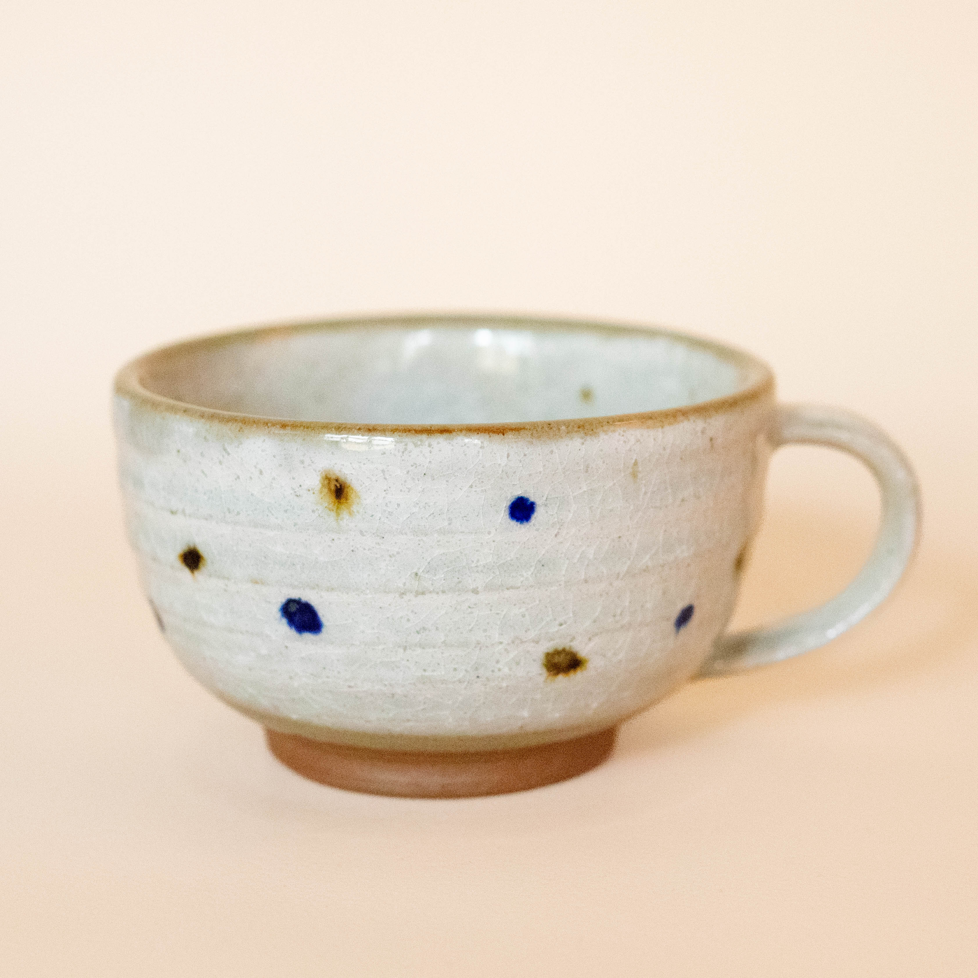 Cappuccino cup with dots