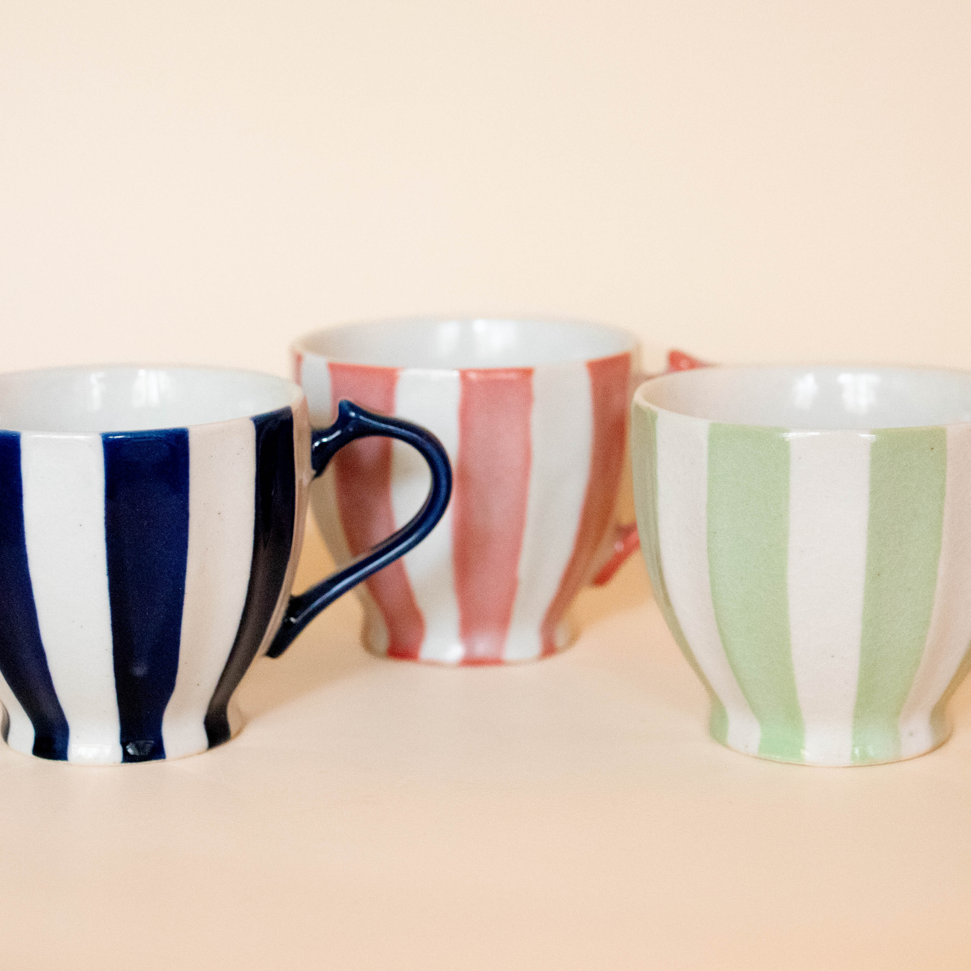 Japanese cup with dark blue stripes