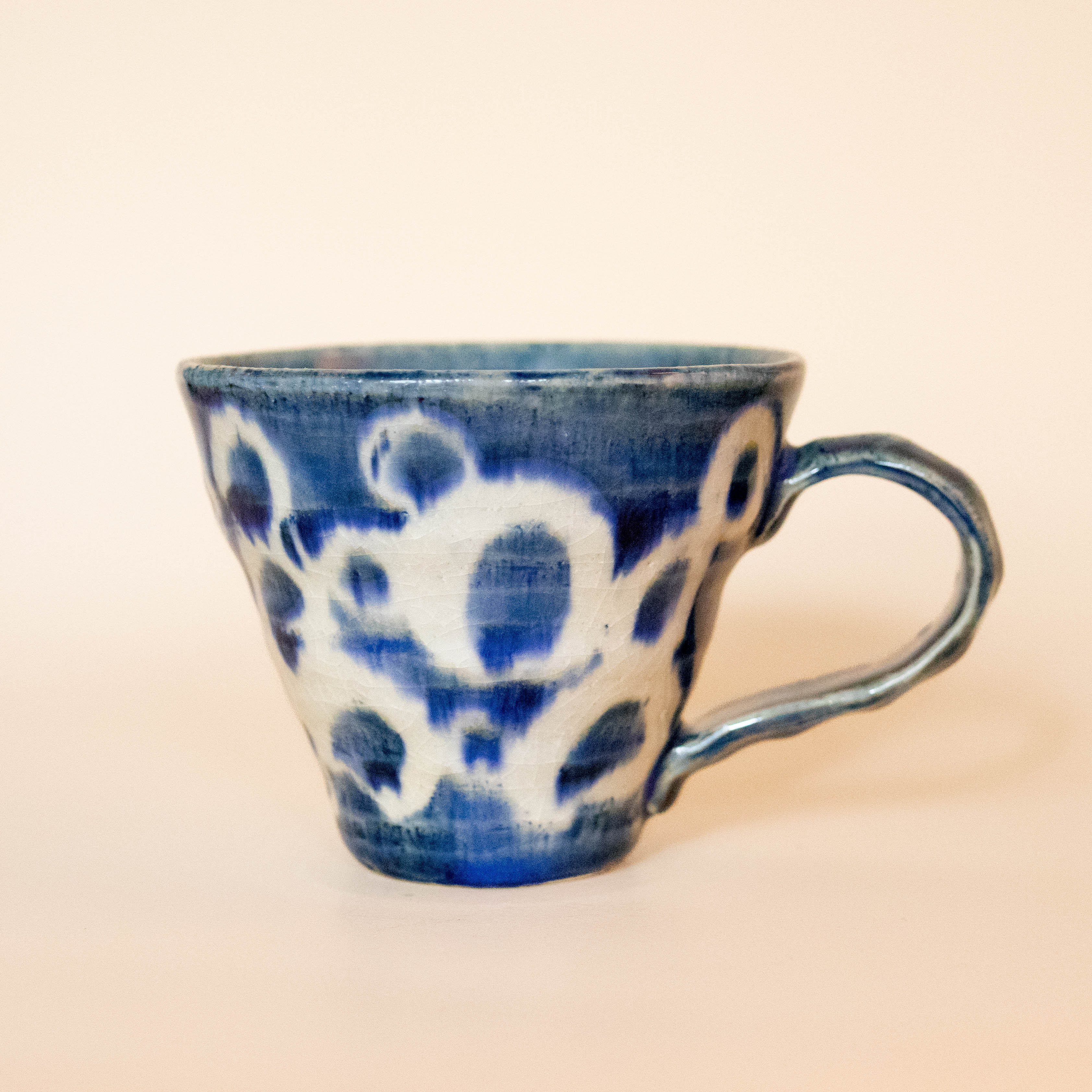 Large Japanese cup with blue glaze and white circles