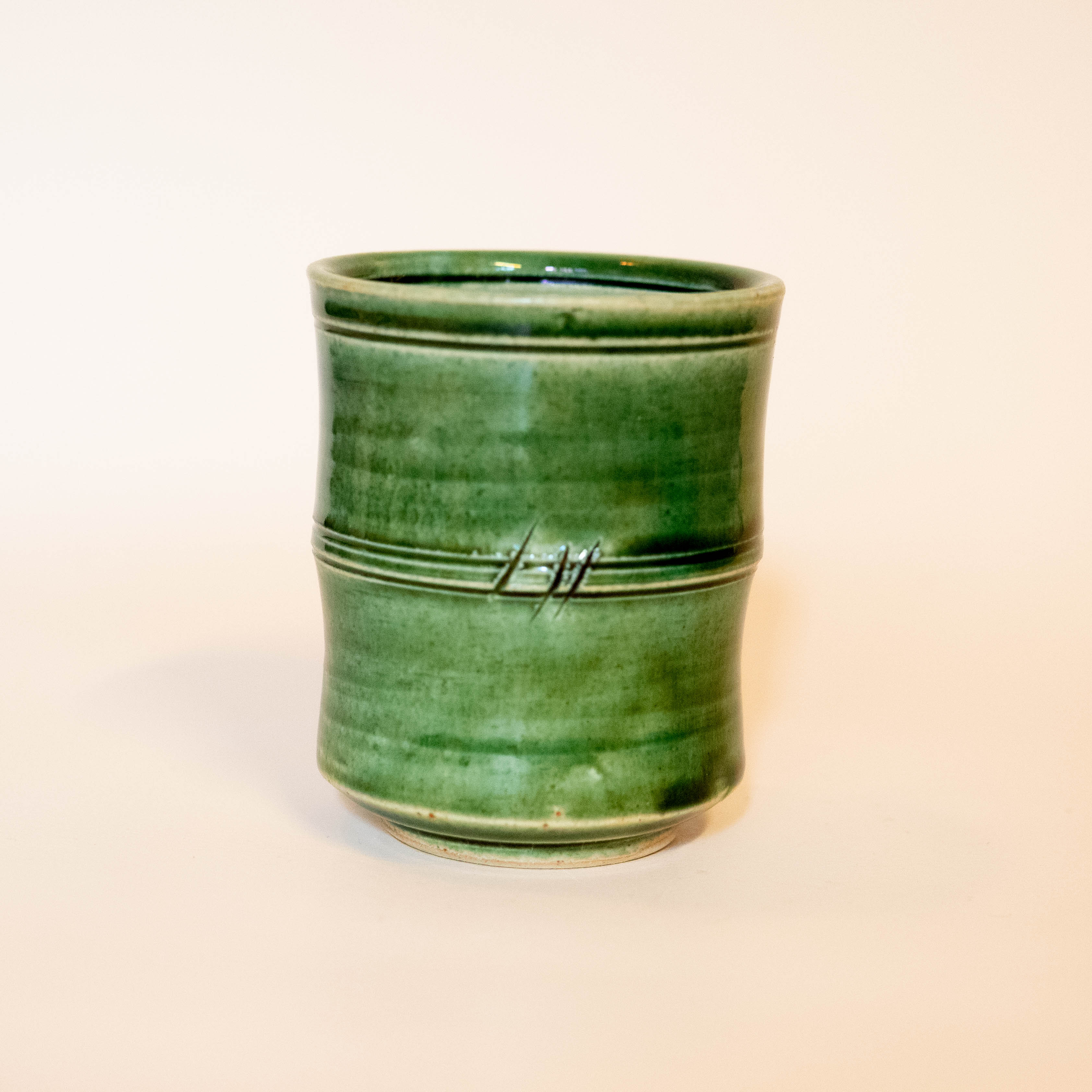 Bamboo cup with green glaze