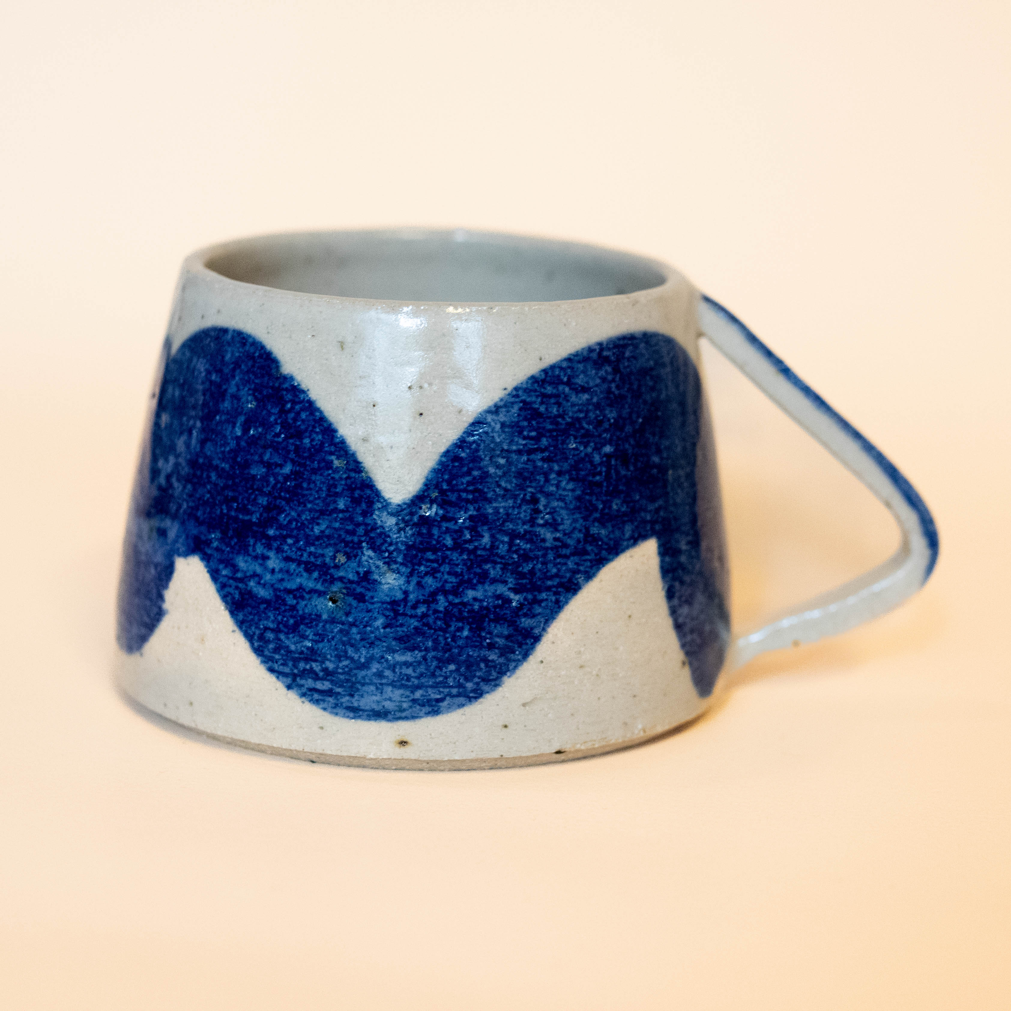 Wavy cup with blue wave