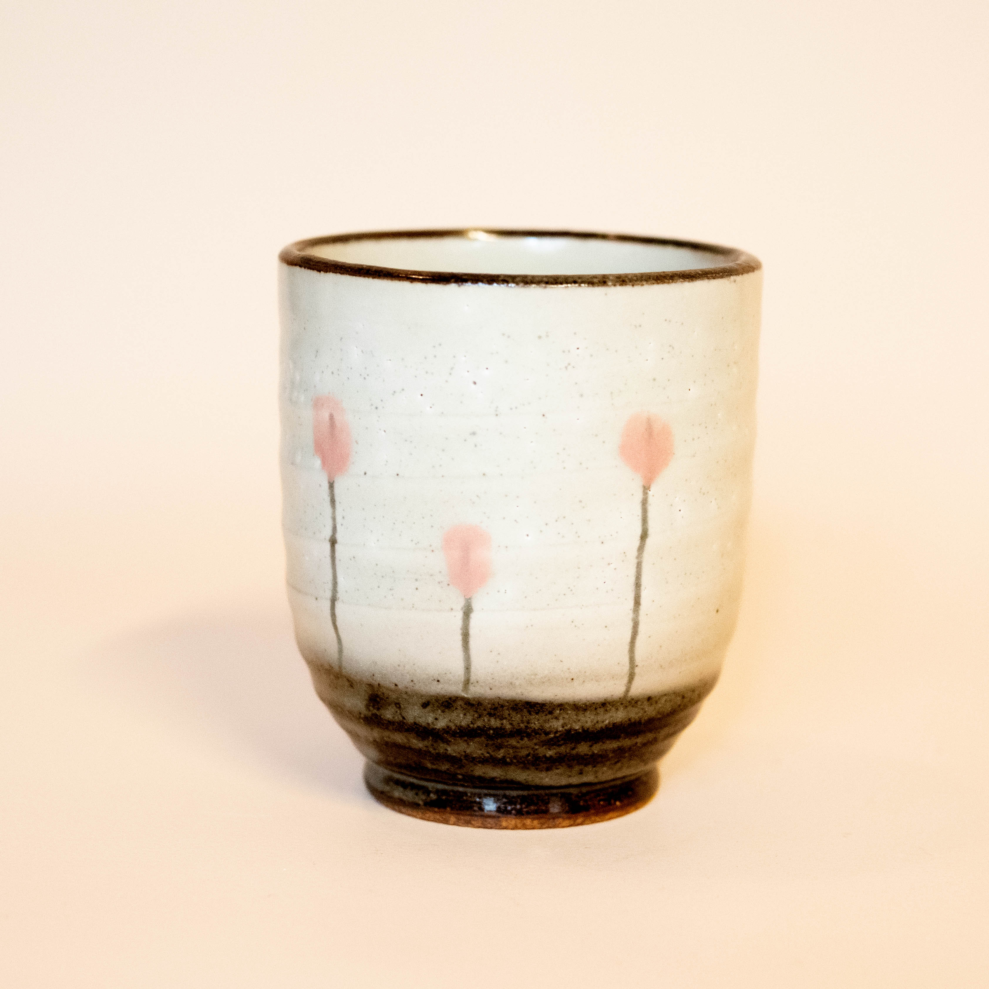 Cup with pink flowers