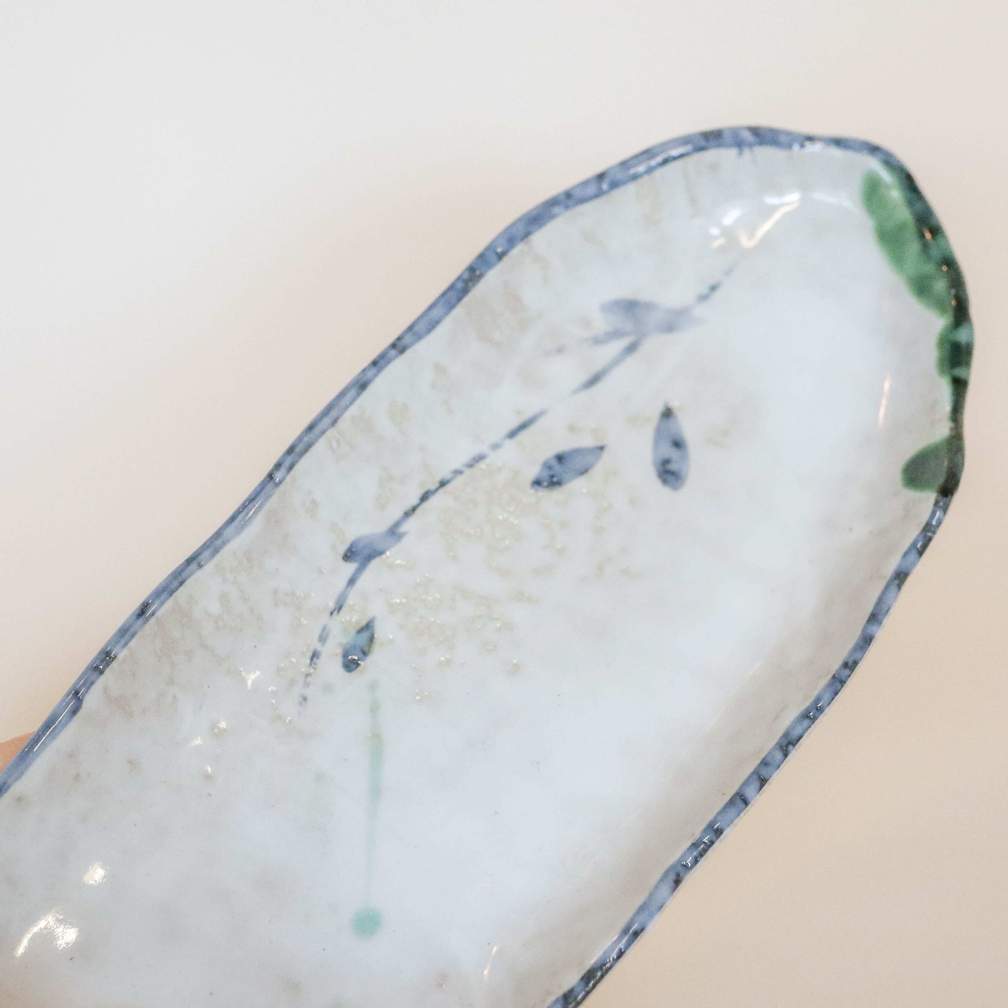 Japanese dish with blue and green pattern, oblong