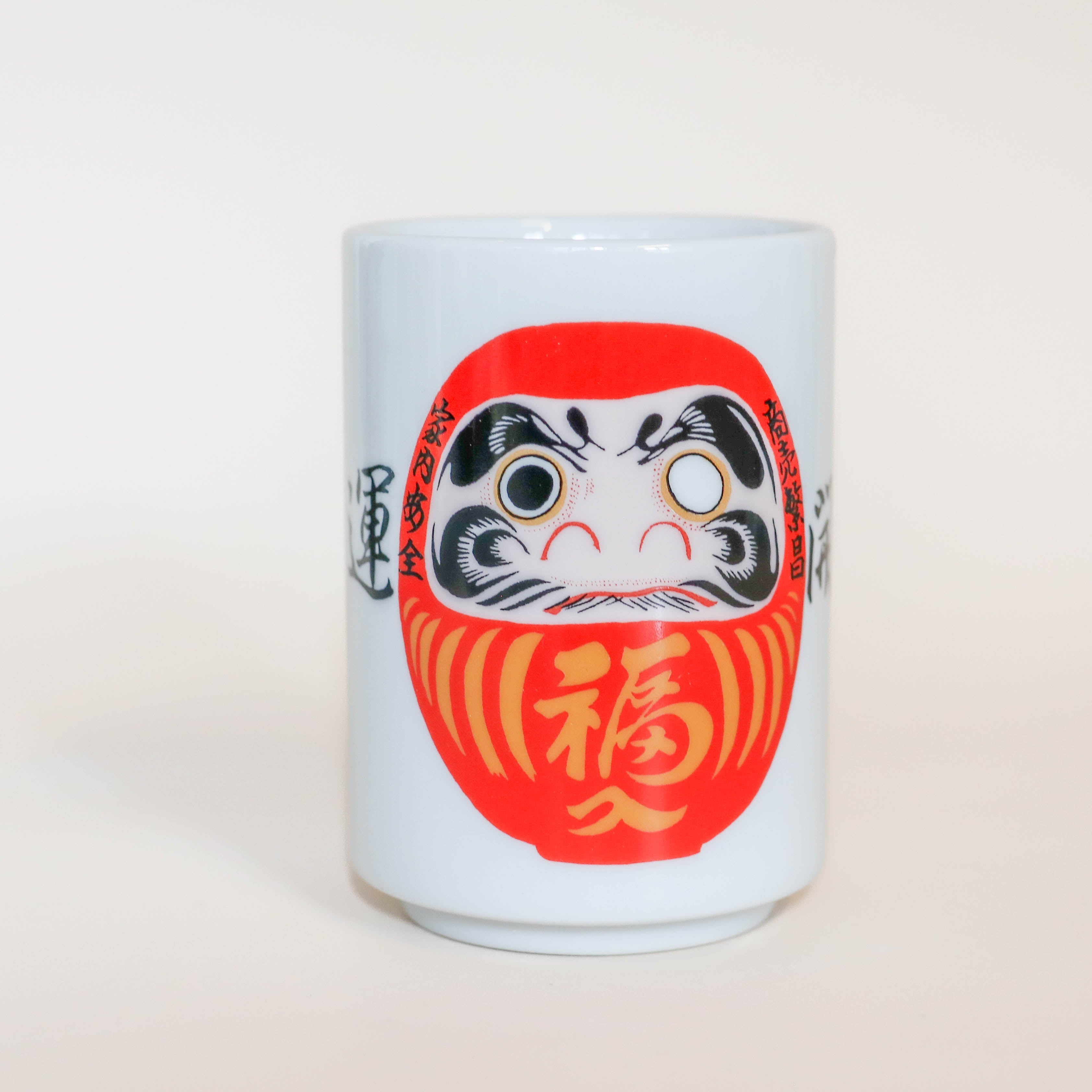 Cup of red Daruma