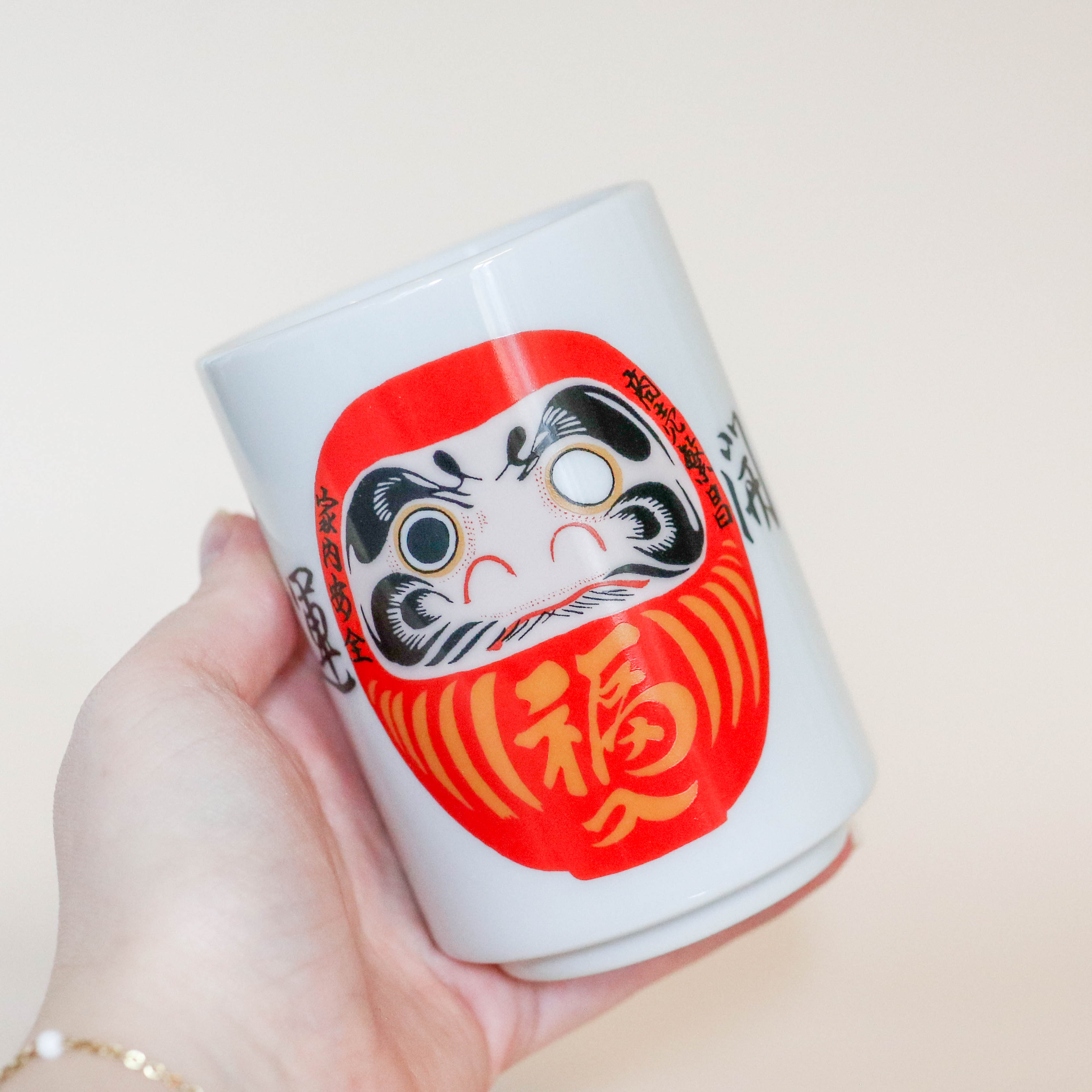 Cup of red Daruma