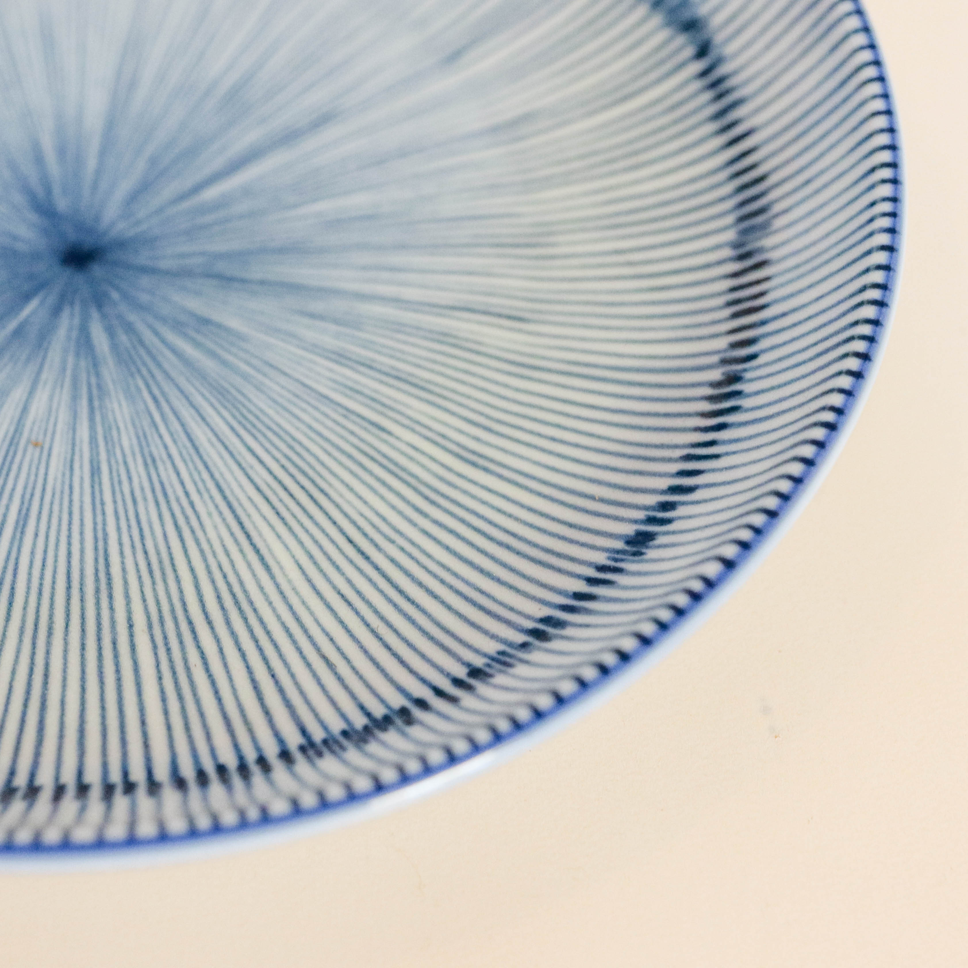 Deep plate/dish with thin blue stripes