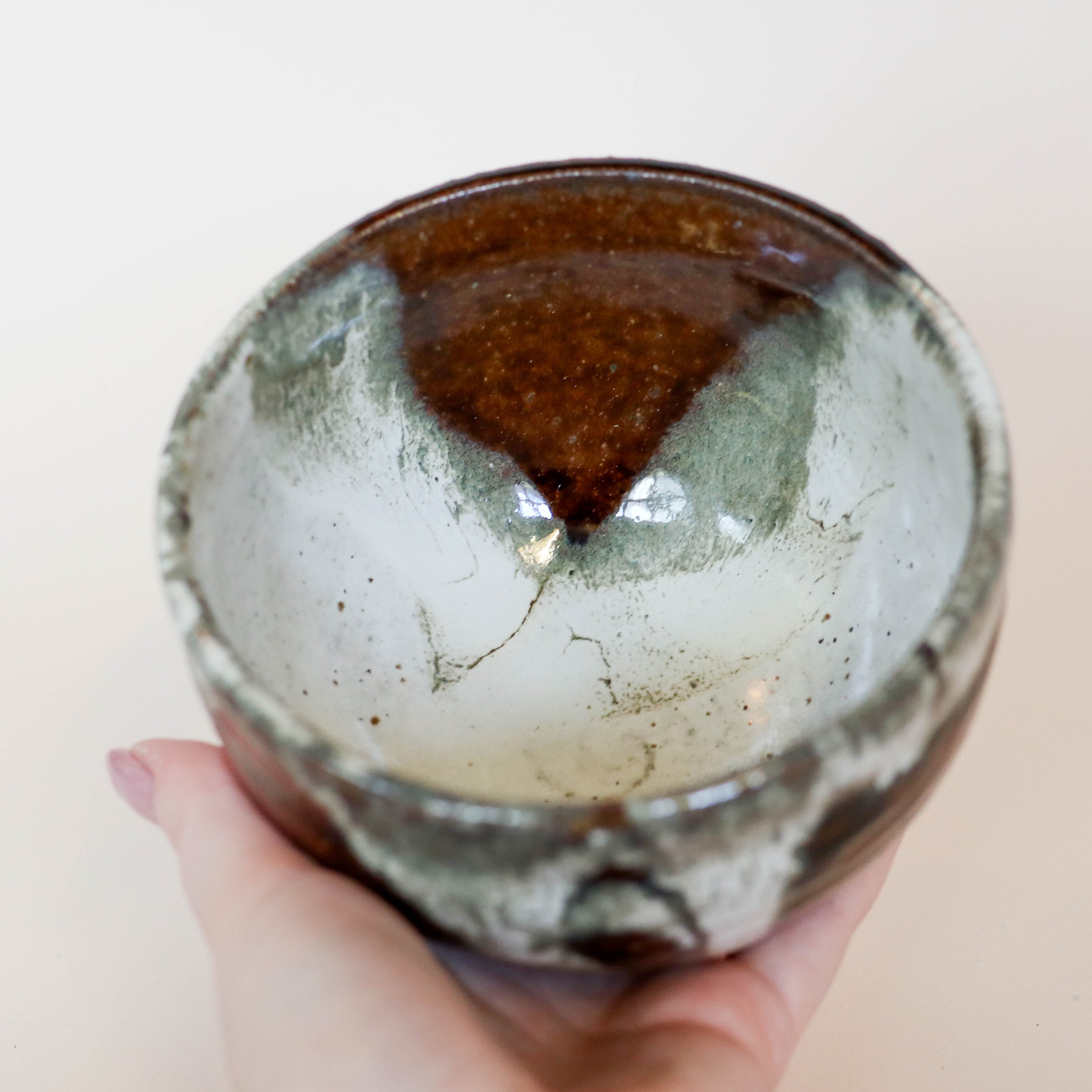 Brown bowl with continuous gray glaze