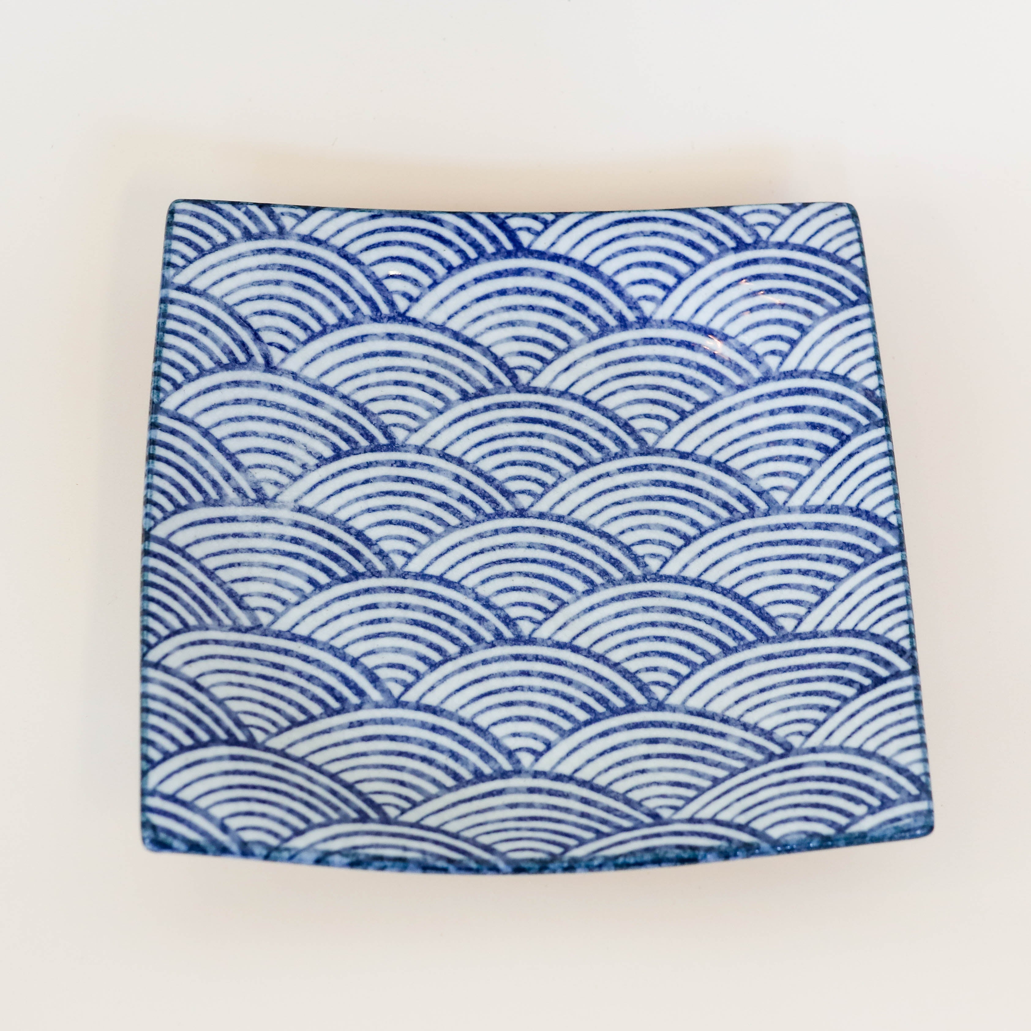 Square dish with blue waves