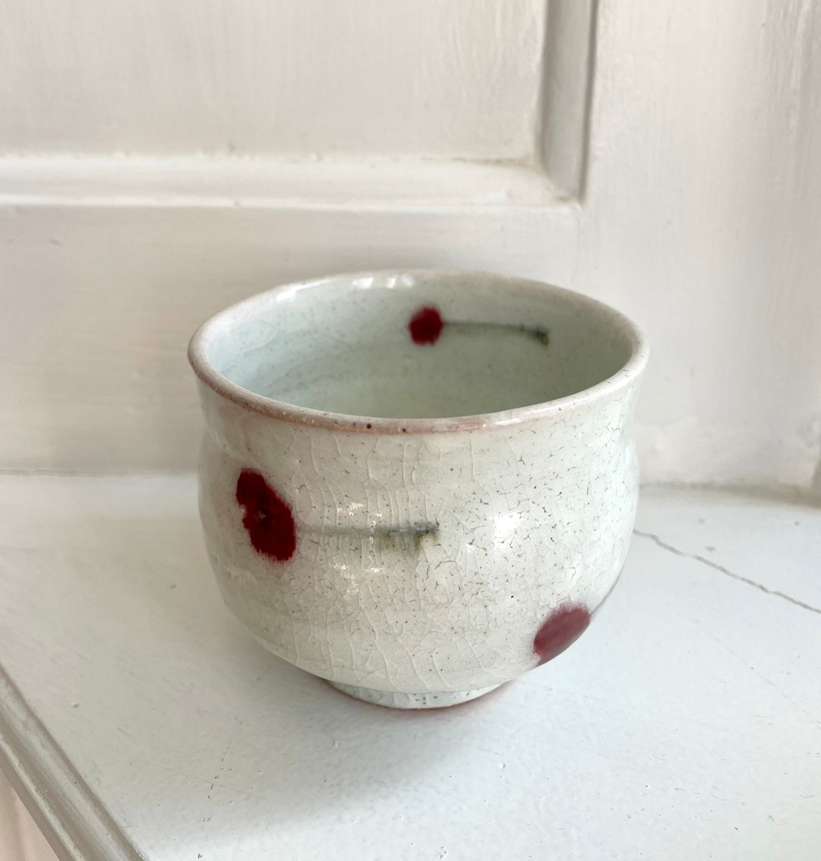 Japanese cup with cherry