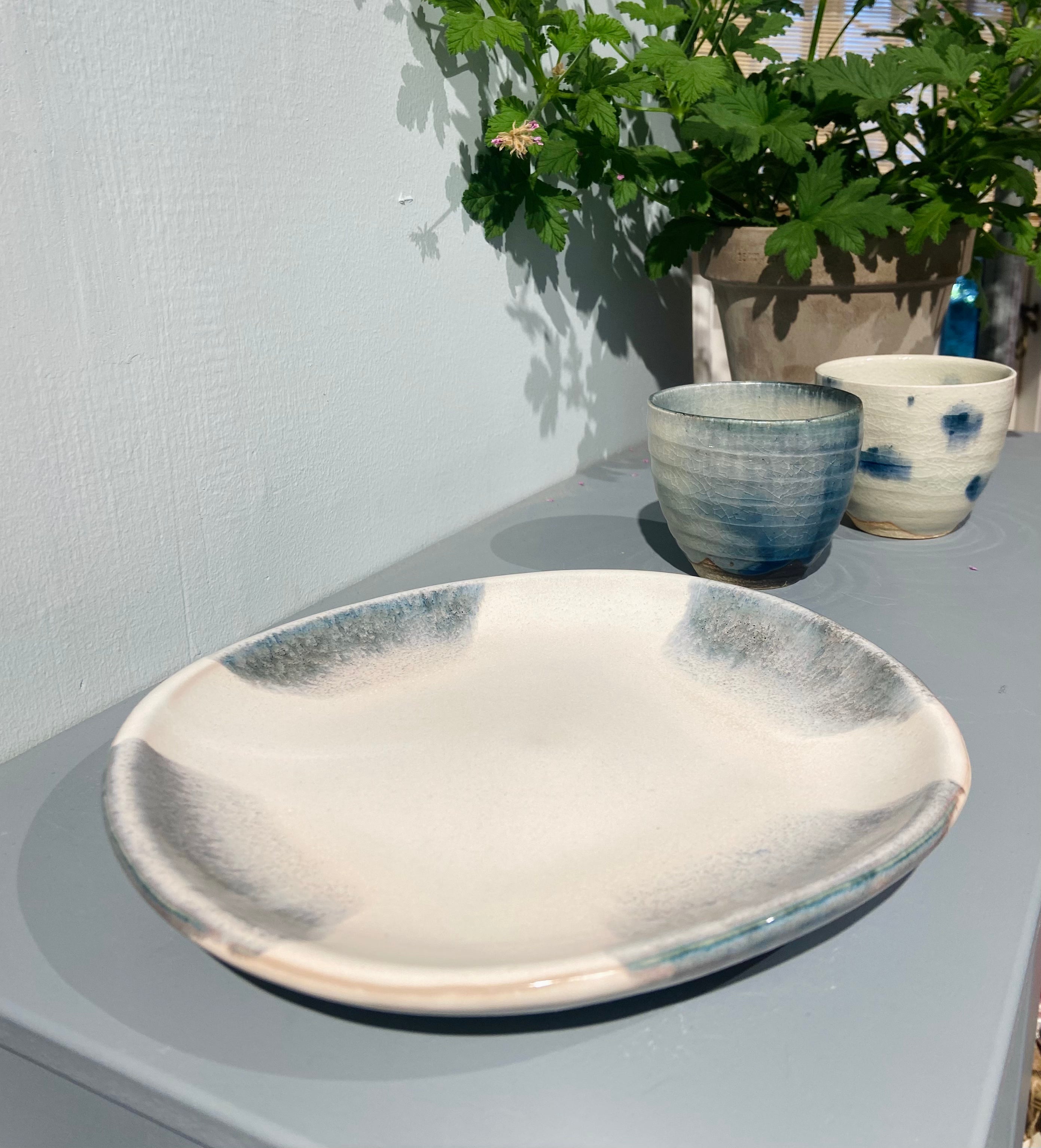 Handmade dish white with blue-grey glaze