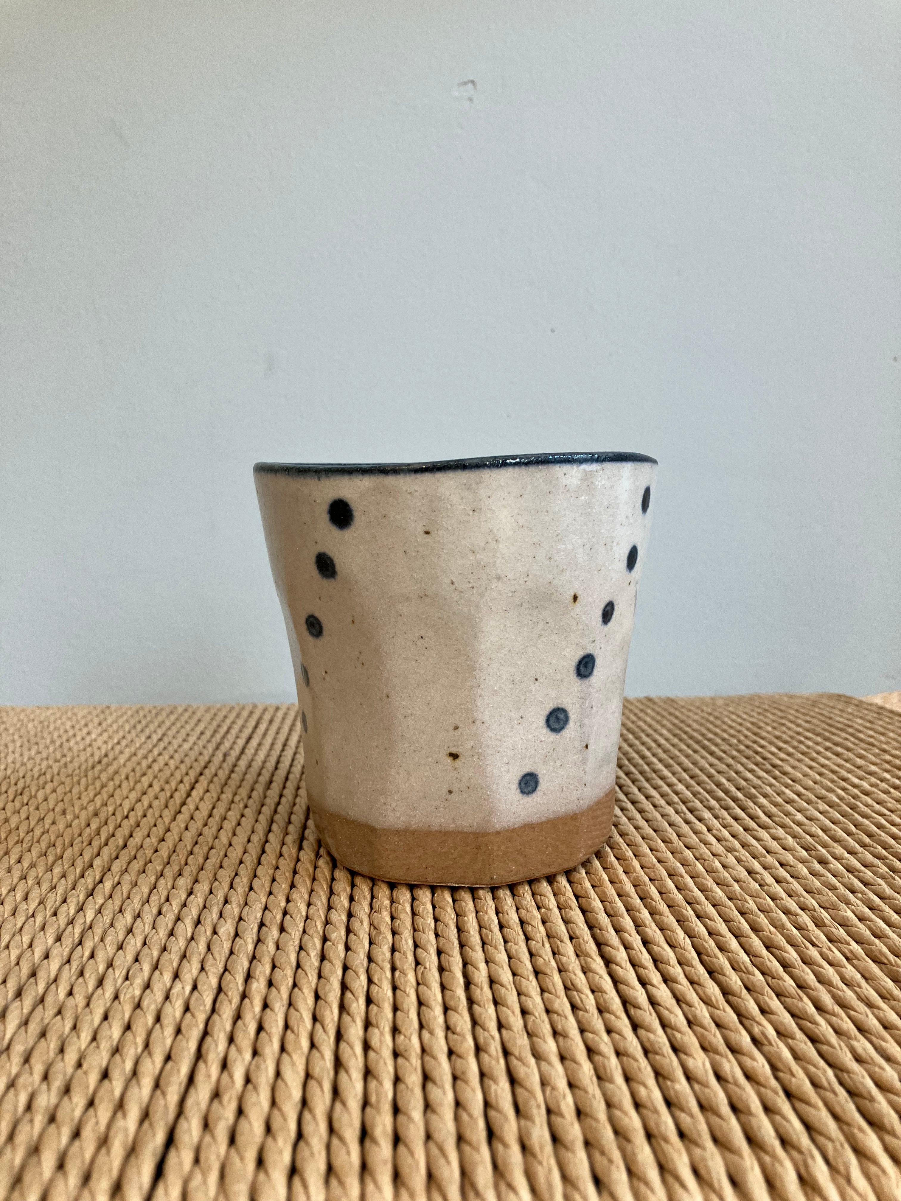 Large mug with beige glaze and blue details