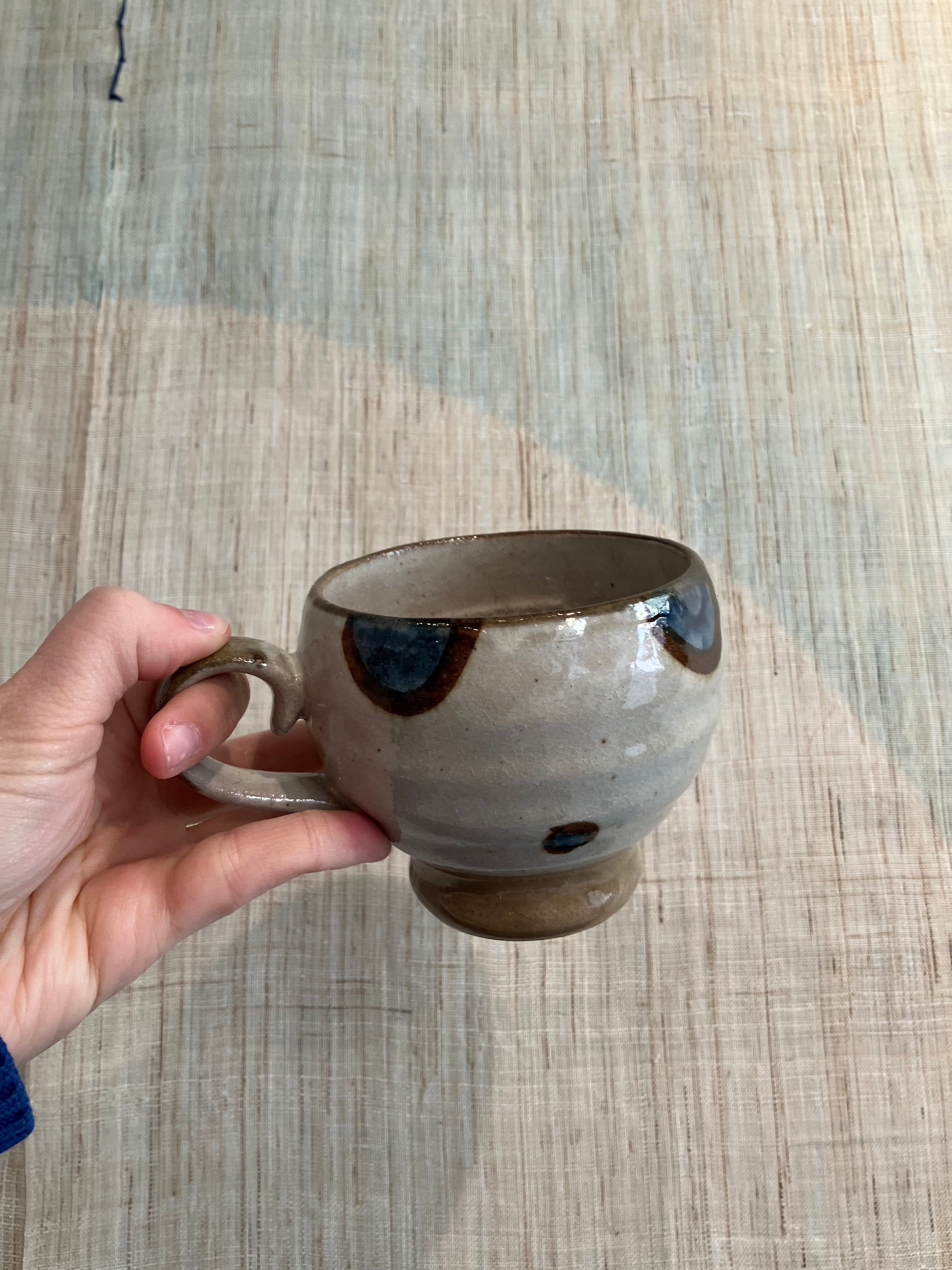 Japanese cup with blue/brown circles and dots