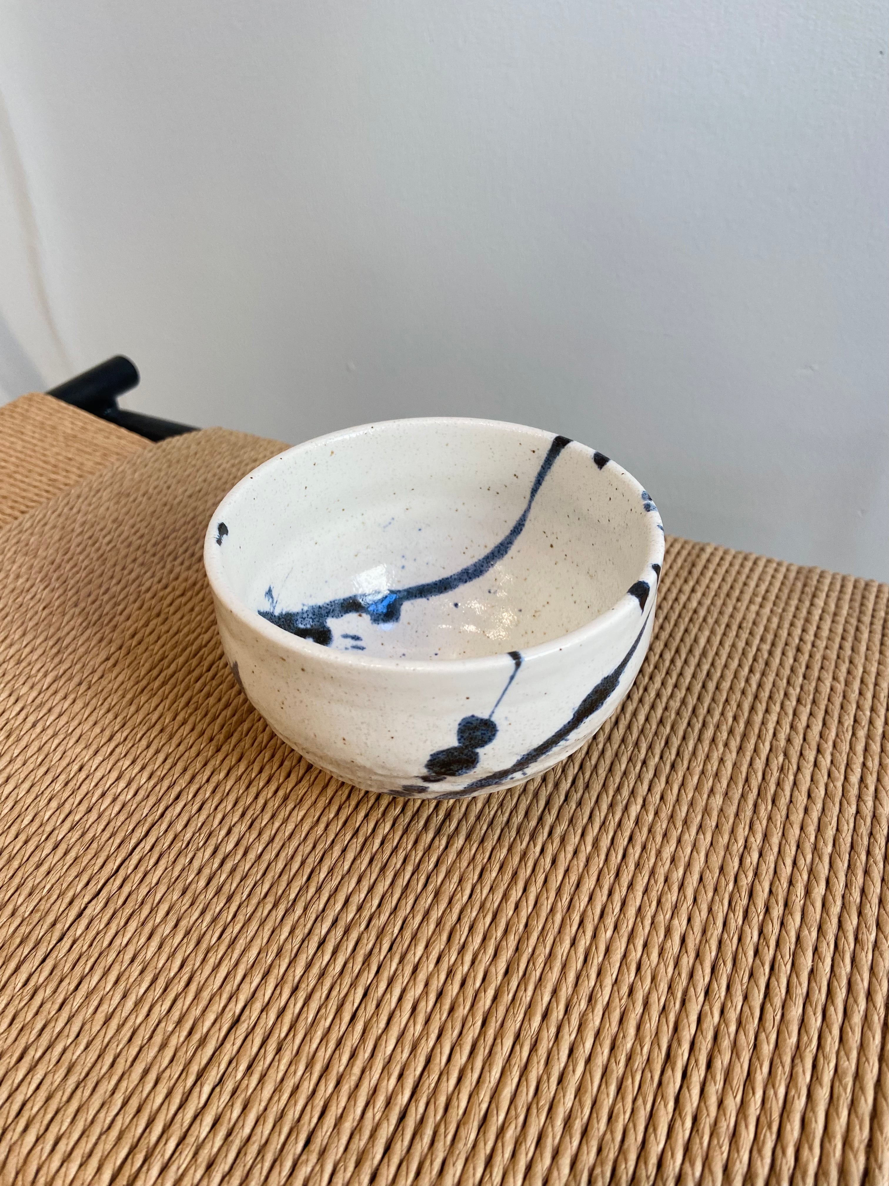 Japanese cup with blue splash pattern